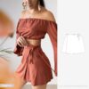 Model wearing a rust-colored mini wrap skirt with waist tie, paired with an off-shoulder crop top – sewing pattern illustration shown on the right. Easy wrap skirt PDF pattern by Make It Yours – The Label.